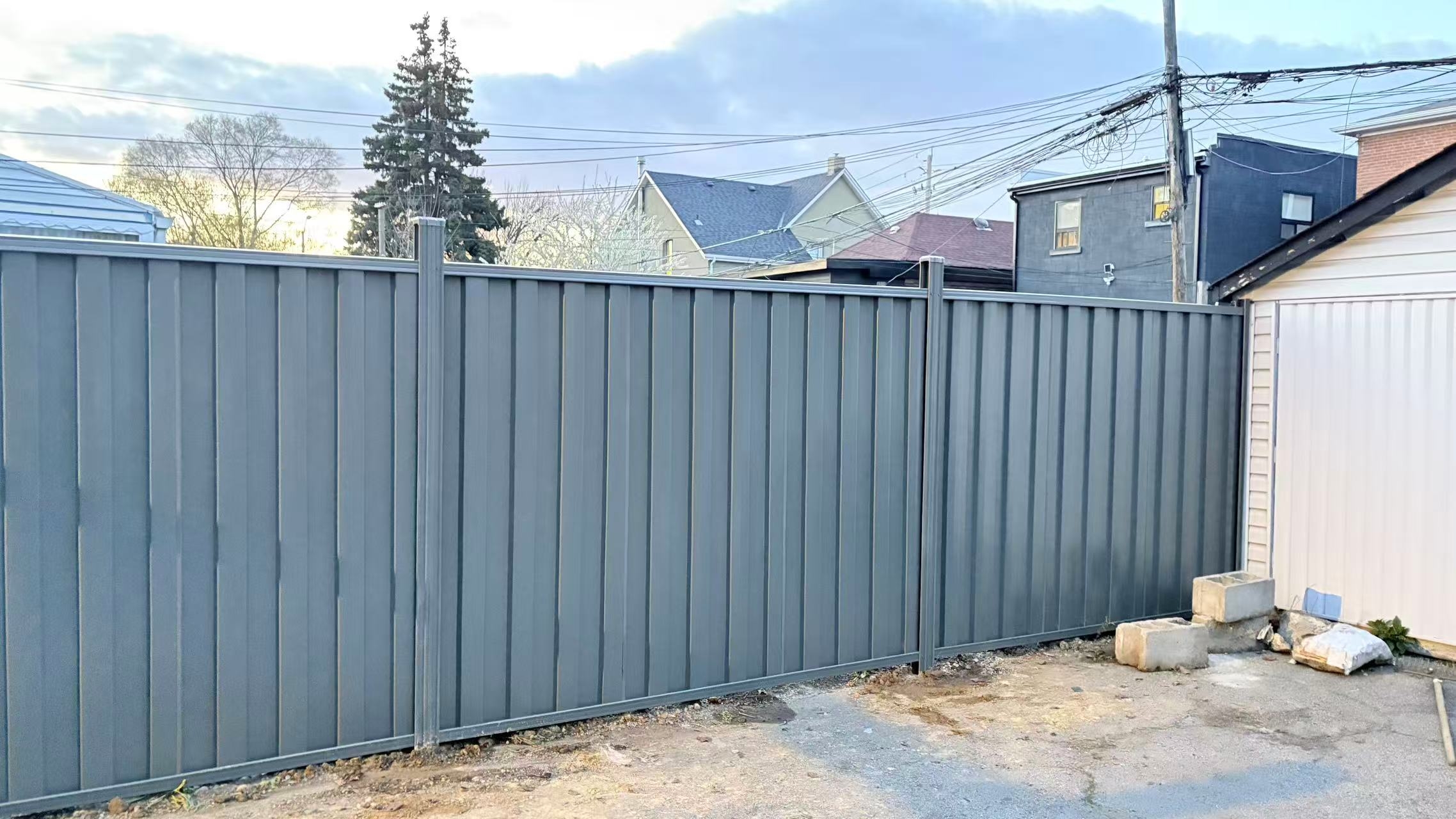 Corrugated steel fence